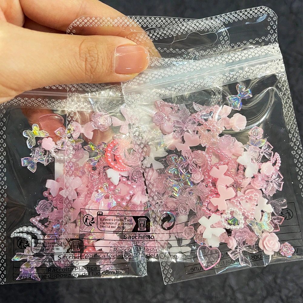 50Pcs 진주 핑크 Bowknot 하트 모양의 라인 석 혼합 네일 장식 Kawaii 꽃 나비 매력 DIY 네일 액세서리