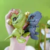 1 Pcs New Tyrannosaurus Rex Bite Hand Toy Keychain Creative Dinosaur Pendant Couple Backpack Pendant Small Gift 1