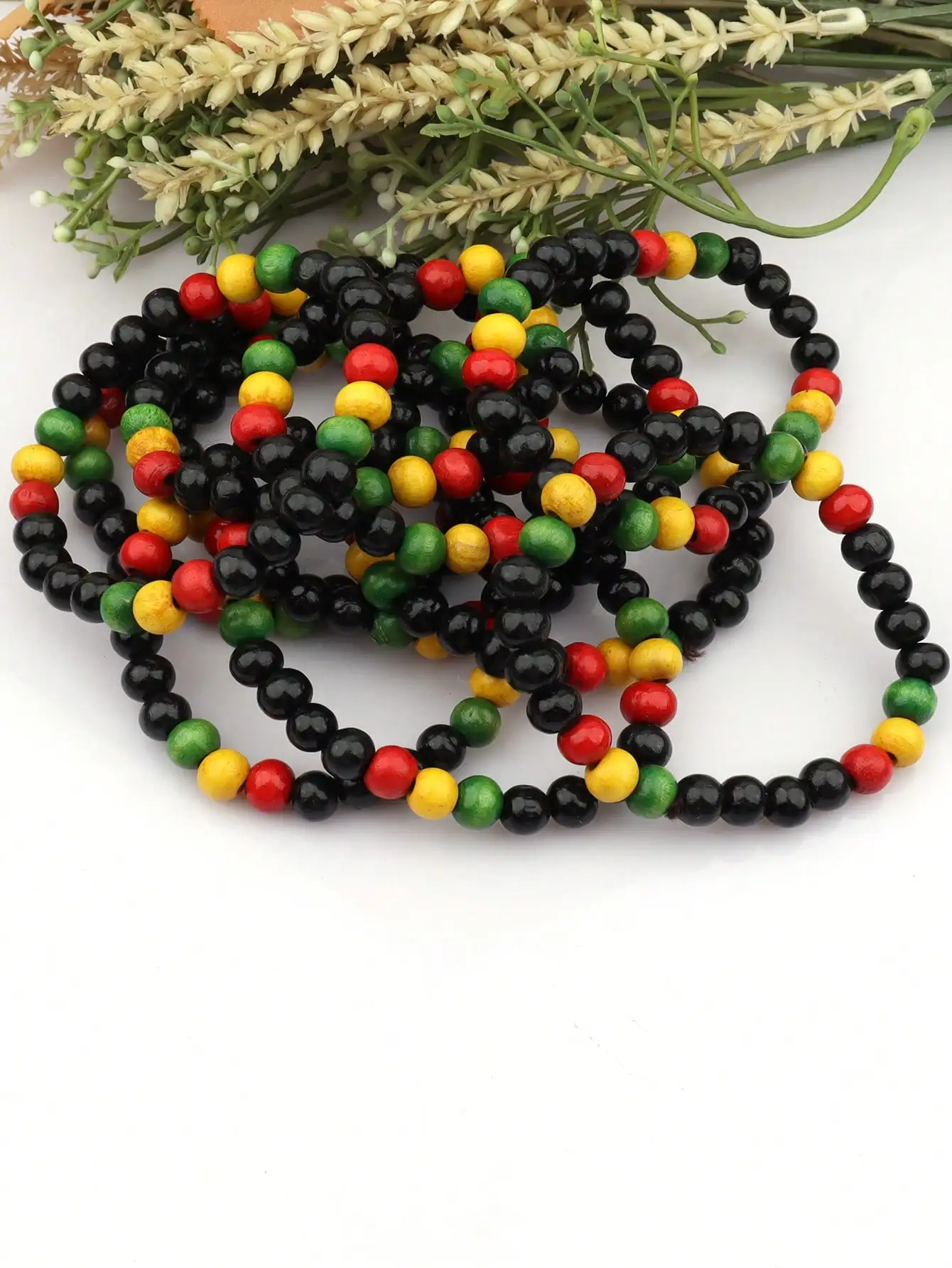 BRACCIALETTI IN LEGNO E MADREPERLA ELASTICI - Gioia d'Oriente