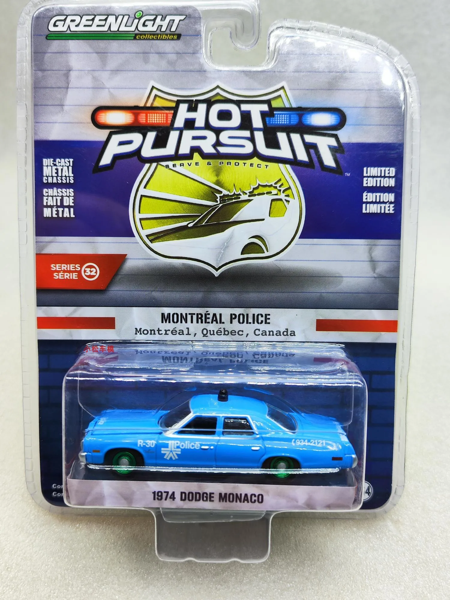 

1: 64 Heat Tracing 32-1974 Mickey Monaco Montreal, Canada Police Car Green Machine Collection of car models