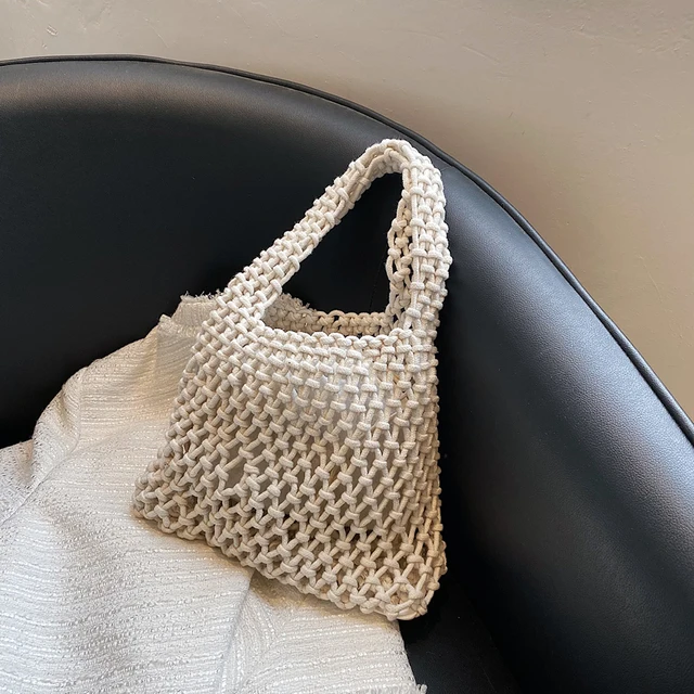 Nuova borsa da spiaggia all'uncinetto per ragazze Corda di paglia estiva Scava fuori Borsa da donna intrecciata a mano Borsa da donna a maglia vuota_voghion.com