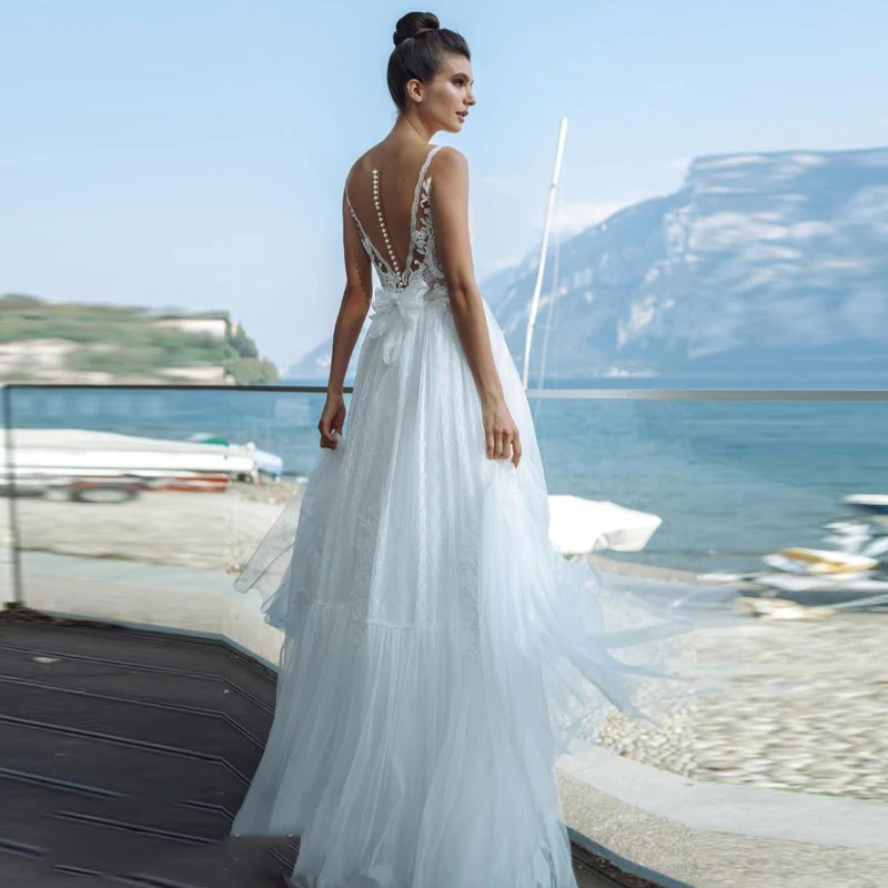 Princess Beach V-neck Tulle Wedding Dress Lace Applique Bow