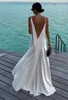 113028-f61389.png Robe de soirée dos nu en satin uni pour femme, blanche, col en V, sans manches, avec fente et bretelles, collection été 2026, robes de cérémonie pour femme