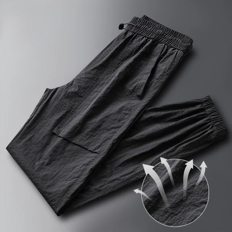 Fashion Elastic Pockets Spliced Solid Color Casual Pants Men's Clothing 2024 Summer New Loose Young Style High Waist Pants