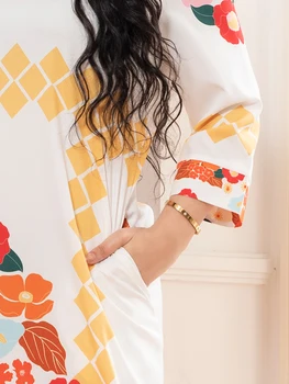 2025 Spring New Arrival: Sweet Vacation-Style V-Neck Floral Color-Blocked Long-Sleeved Midi Dress 6