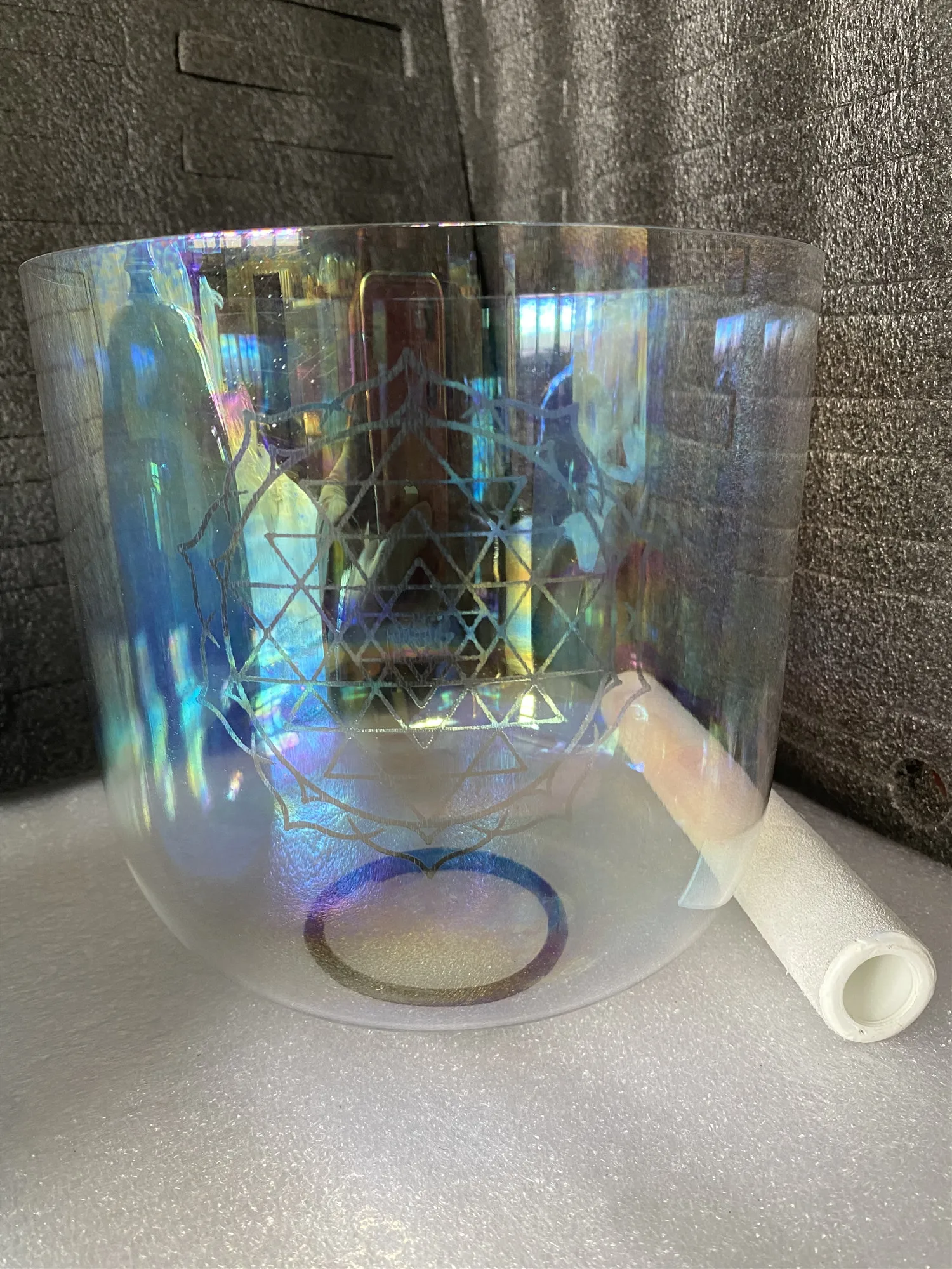 Heart chakra Crystal singing bowl 3rd octave F note clear cosmic color with "shri yantra" engraving for sound healing.