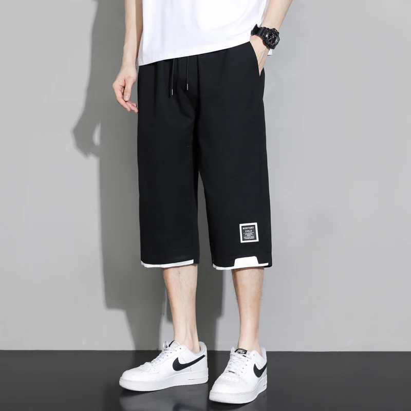 Summer New Solid Color Fashion Elastic Waist Wide Leg Trousers Man High Street Pockets Drawstring All-match Calf-Length Pants