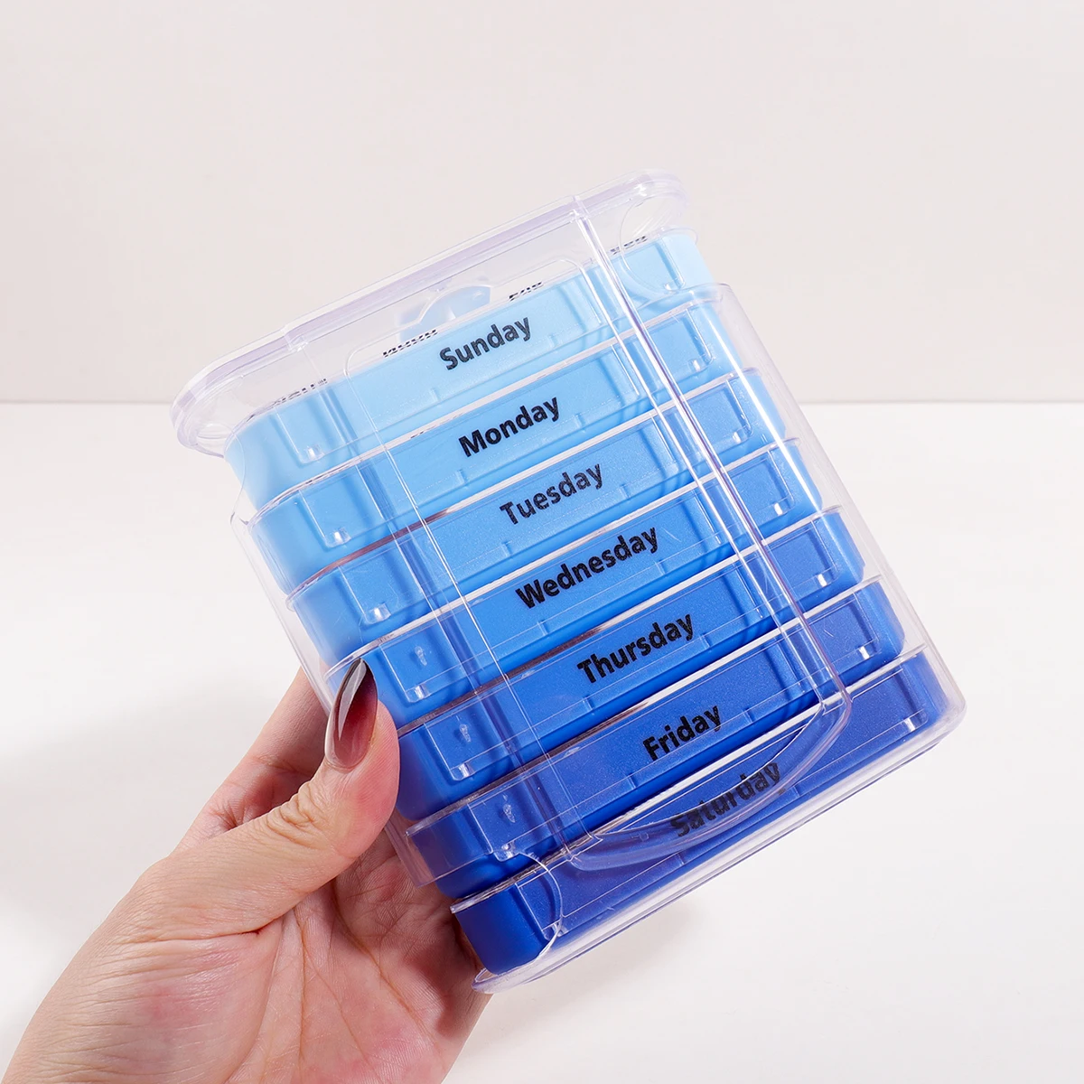 Portable 7-Day Pill Organizer with 28 Compartments for Daily Medication Management