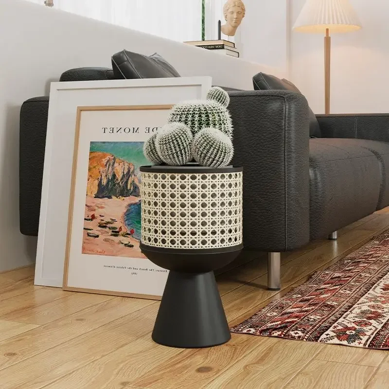 A Minimalist Iron Art Indoor Potted Plant Stand with A Mobile Design Resembling Rattan Weaving Desktop Flowerpot