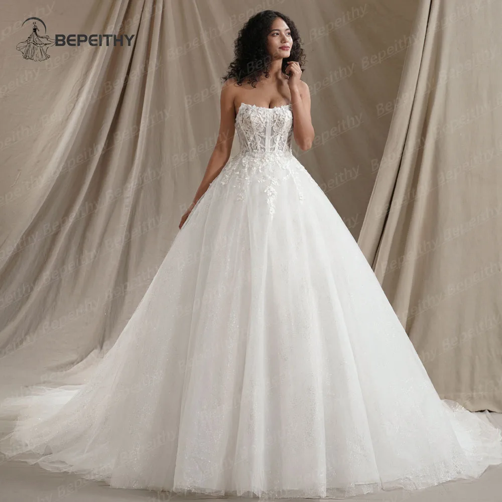 BEPEITHY Customized Strapless Glitter Princess Wedding Dresses 2026 Women Sleeveless 3D Flowers Bride Sexy Bridal Gown Vestido
