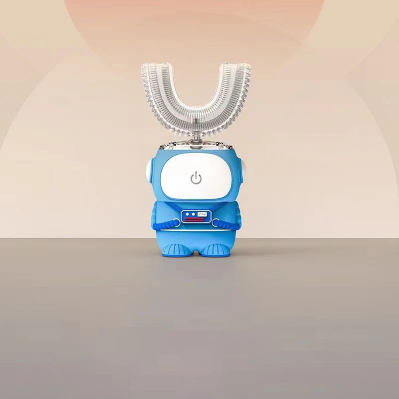 thumbnail image 1 of Cepillo de dientes eléctrico en forma de U para niños, limpiador de dientes de silicona con carga USB, dibujos animados para niños, cepillo de dientes automático de 360°, luz azul, 1 of 5
