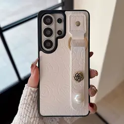 Luxury Camellia Leather Pearl Wrist Strap Phone Case - Shockproof Bumper Holder Cover for Galaxy S23 Ultra (White GS)