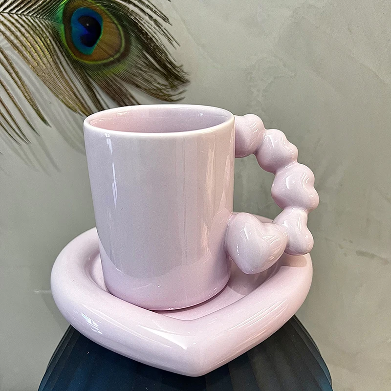 https://ae01.alicdn.com/kf/S173b8d6cf3fa40cebf42a595bd8546e5T/Creative-Heart-Coffee-Cup-With-Heart-Shape-Saucer-Yellow-Pink-Purple-Silver-Pearl-White-Ceramic-Tea.jpg