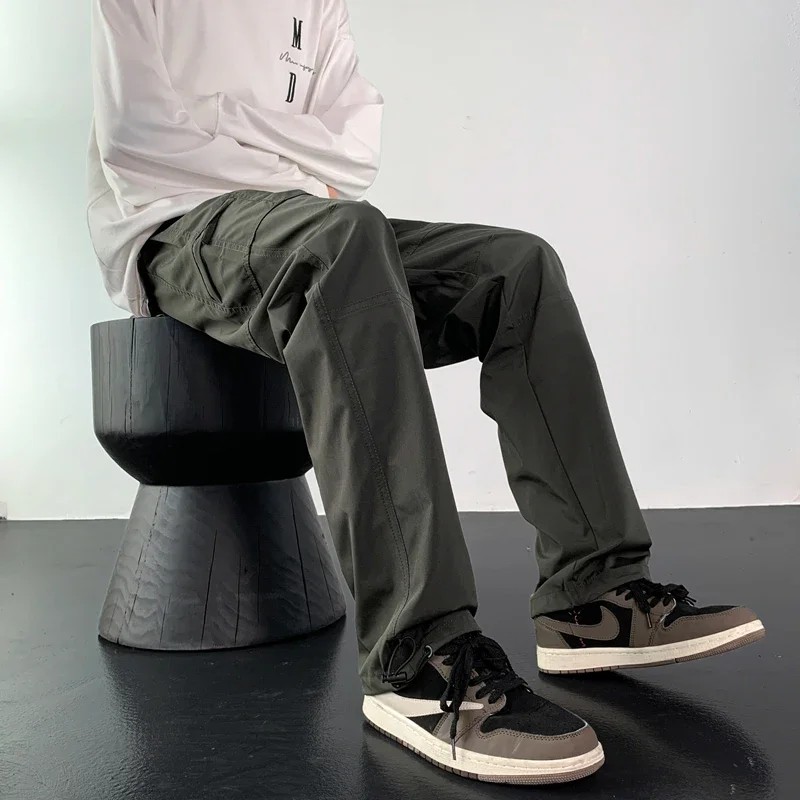 

Заряжайте американские функциональные прямые длинные брюки, быстросохнущие рабочие брюки, модные и модные мужские весенне-летние