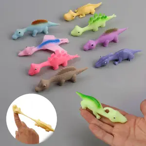 10-50 pcs Dinosaur Finger Slingshot Animal Toys Flying Finger Dinosaur Toy