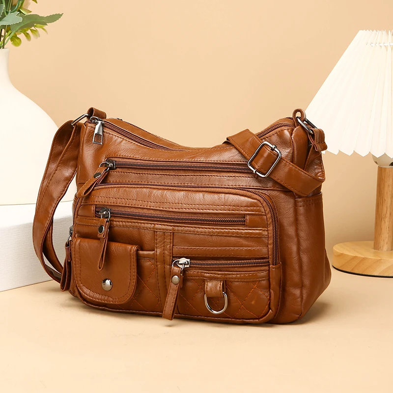 Women's crossbody bag, synthetic leather shoulder bag with adjustable shoulder straps, lightweight multi pocket bag with zipper