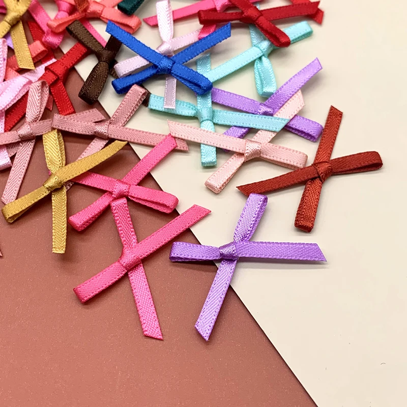 Description Picture 2 of item100pcs Mini Satin Ribbon Flowers Bows Ties Craft Scrapbooking Embellishment DIY Projects Bowties Decor Hair Clips Pets Hair Bows