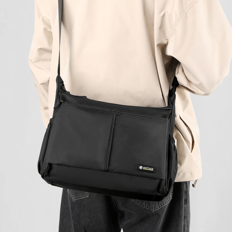 Men's multi pocket casual shoulder bag with adjustable shoulder straps and zipper closure, ideal for daily commuting