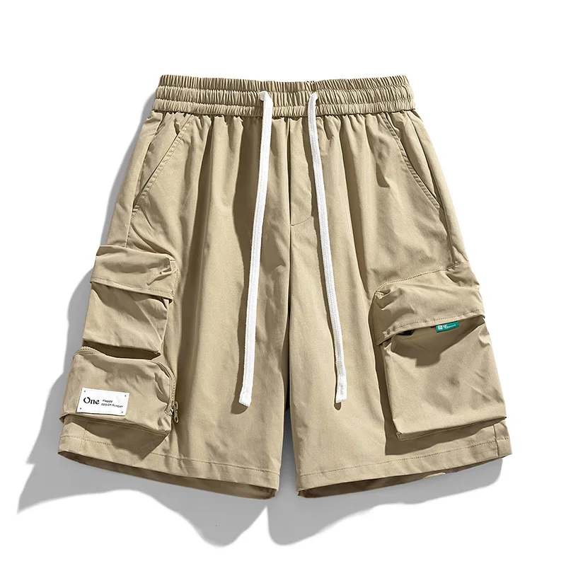 Fashion Spliced Pockets Solid Color Cargo Shorts Men's Clothing 2024 Summer New Loose Elastic Lace Up Solid Color Casual Shorts