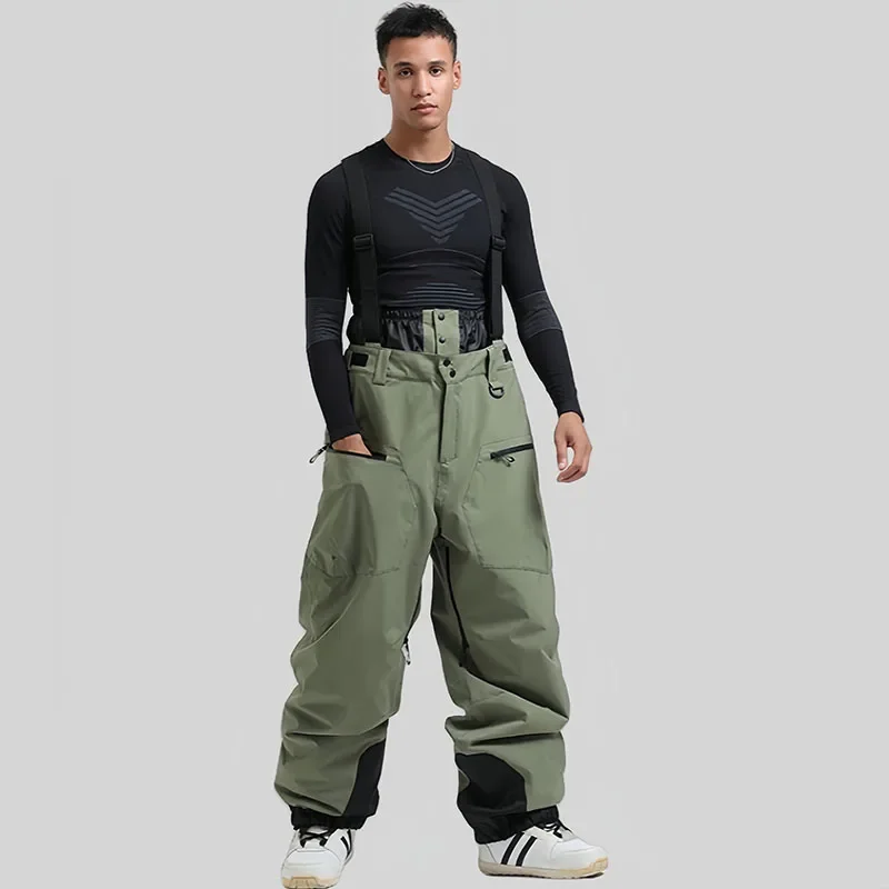 Skiing Pants Outdoor Winter Ski Overalls Strap Pants Thickening Warm Men Women Loose Snow Waterproof Windproof Snowboard Trousers