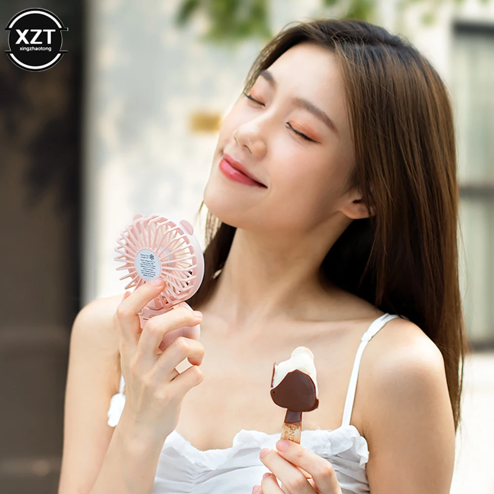 Mini Handheld Fan with LED Fill Light Outdoor Mini Creative Desktop Office Mute Charging Portable Handheld Fan