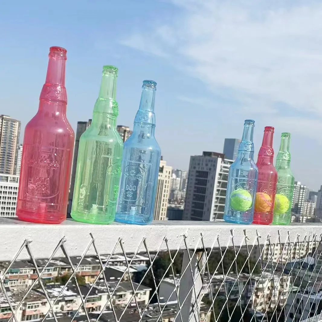 Dog toy bottle TPR tennis bottle pet cat puzzle resistant bite resistant sound making rubber floating relieve boredom