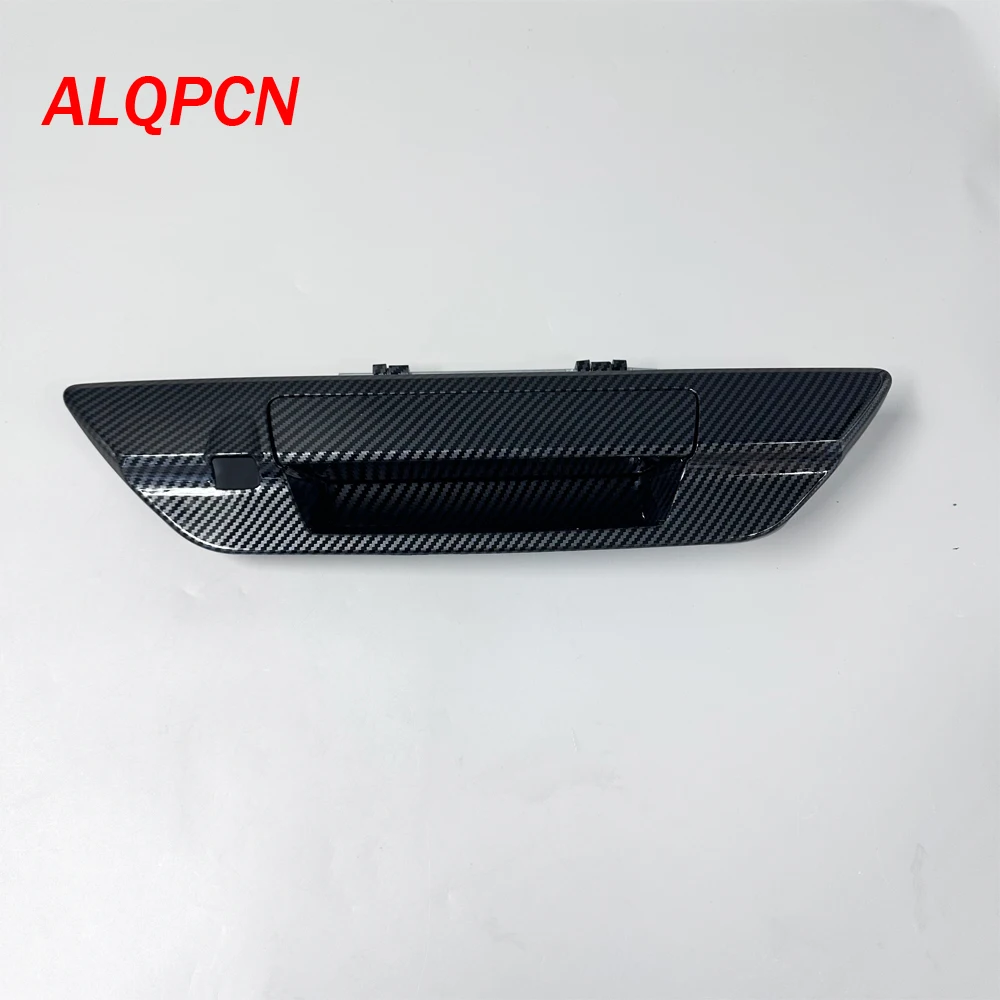 

Для карбонового волокна окрашенная задняя дверь открытая ручка подъемная дверь ручка с отверстием для камеры тип для Toyota Hilux Revo 2015-2019