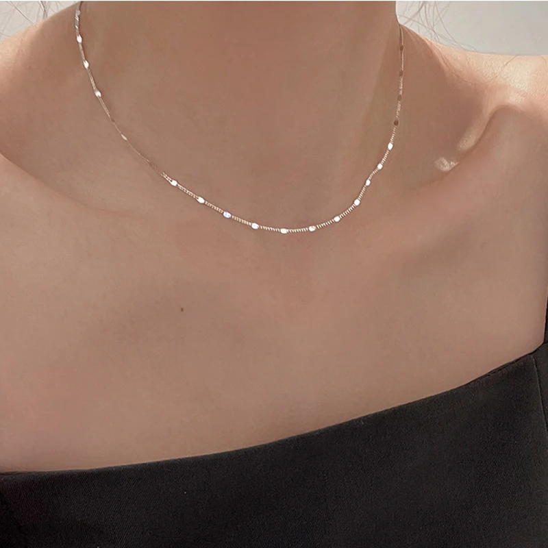 Collana girocollo in argento sterling con perline piatte dorate