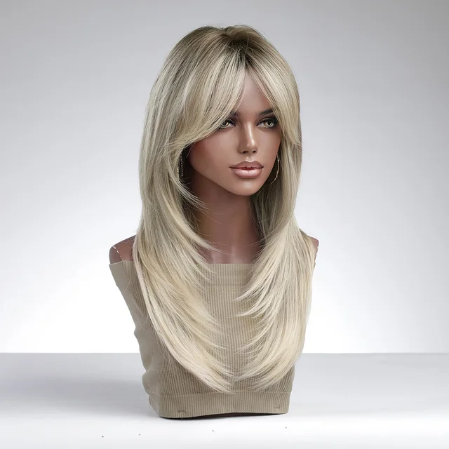 Long and straight, this high-quality synthetic wig with bangs is perfect for women who want to change up their look. It's designed to look natural and can withstand heat, making it suitable for daily wear - Image 3