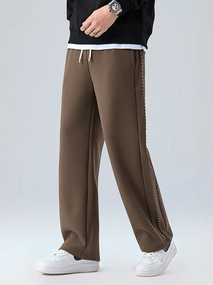 2025 Autunno Nuovi pantaloni sportivi in cotone pesante da uomo Tessuto strato d'aria di alta qualità Pantaloni sportivi dritti vestibilità ampia Pantaloni in maglia drappeggiati 5