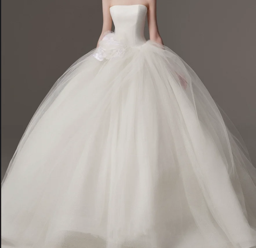 New minimalist wedding dress with fairy flowers and dreamy designs