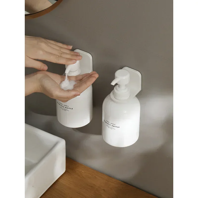 1/2pcs Adjustable Dispenser Bottle Holder Wall Mounted Adhesive Shampoo Lotion Hand Soap Bottle Hanger Bathroom Storage Rack 2