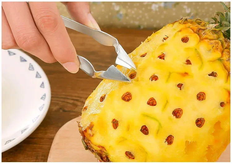 Description Picture 4 of itemStainless Steel Strawberry Huller Fruit Peeler Pineapple Corer Slicer Cutter Kitchen Knife Gadgets Pineapple Slicer Clips New