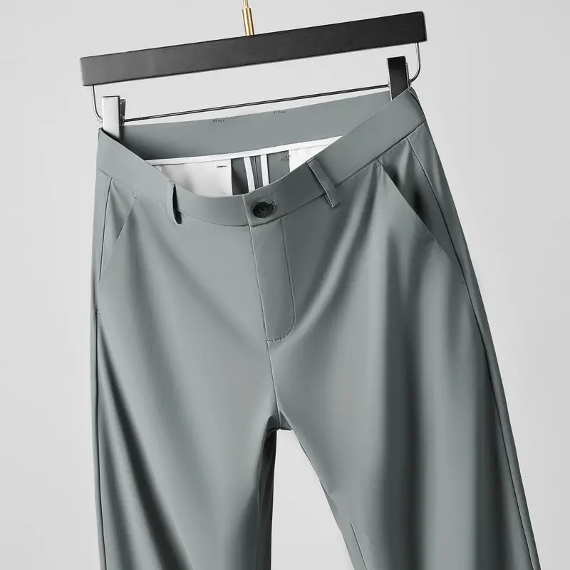 Comfortable Minimalist Business Casual 2024 Summer Men's New Spliced Button Zipper Pocket Fashion Solid Slim Straight Leg Pants