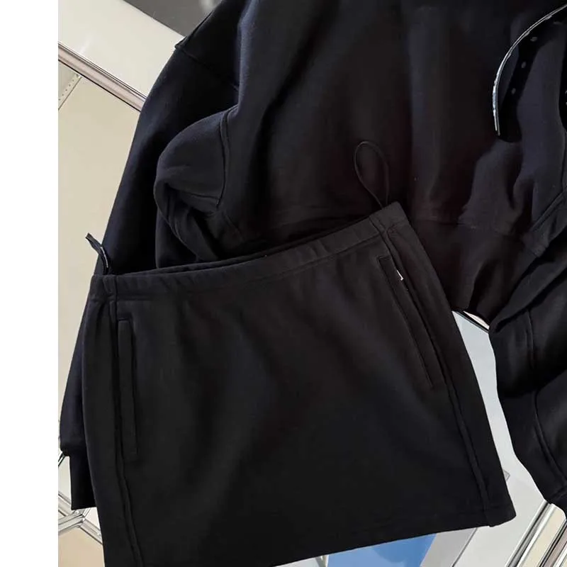 

Модный темпераментный высококачественный дизайнерский комплект из 2 предметов, повседневный Женский пуловер с высоким воротником, пикантная облегающая теплая Женская мини-юбка, 2 цвета
