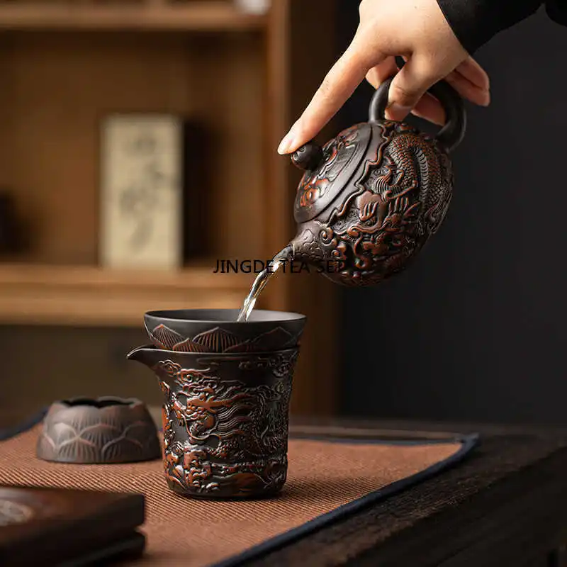 Small capacity purple pottery Xiao Long handmade antique relief teapot household kung fu tea set