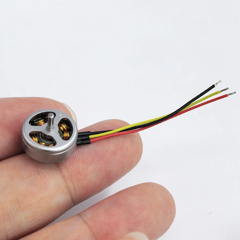 Moteur sans balais 1103 15000KV pour micro drone et avion RC, avec stator et rotor exposés.