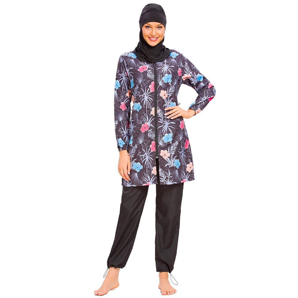 Modest appareal swimwear featuring elegant dark blue tones and soft floral prints.