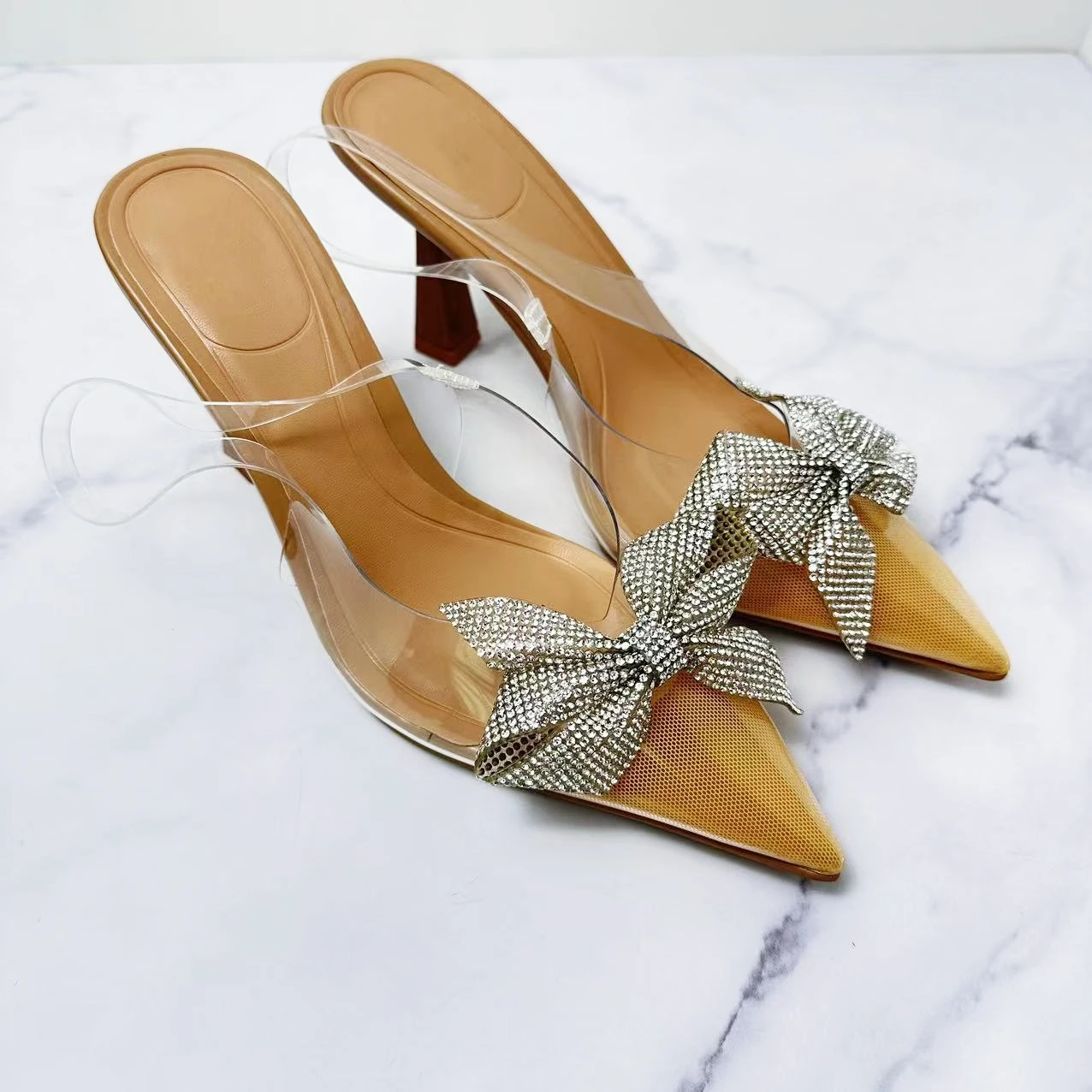 

2024 New Women's Shoes Fashion Pointed Rhinestone Bow Transparent High Heels Stiletto Sandals.