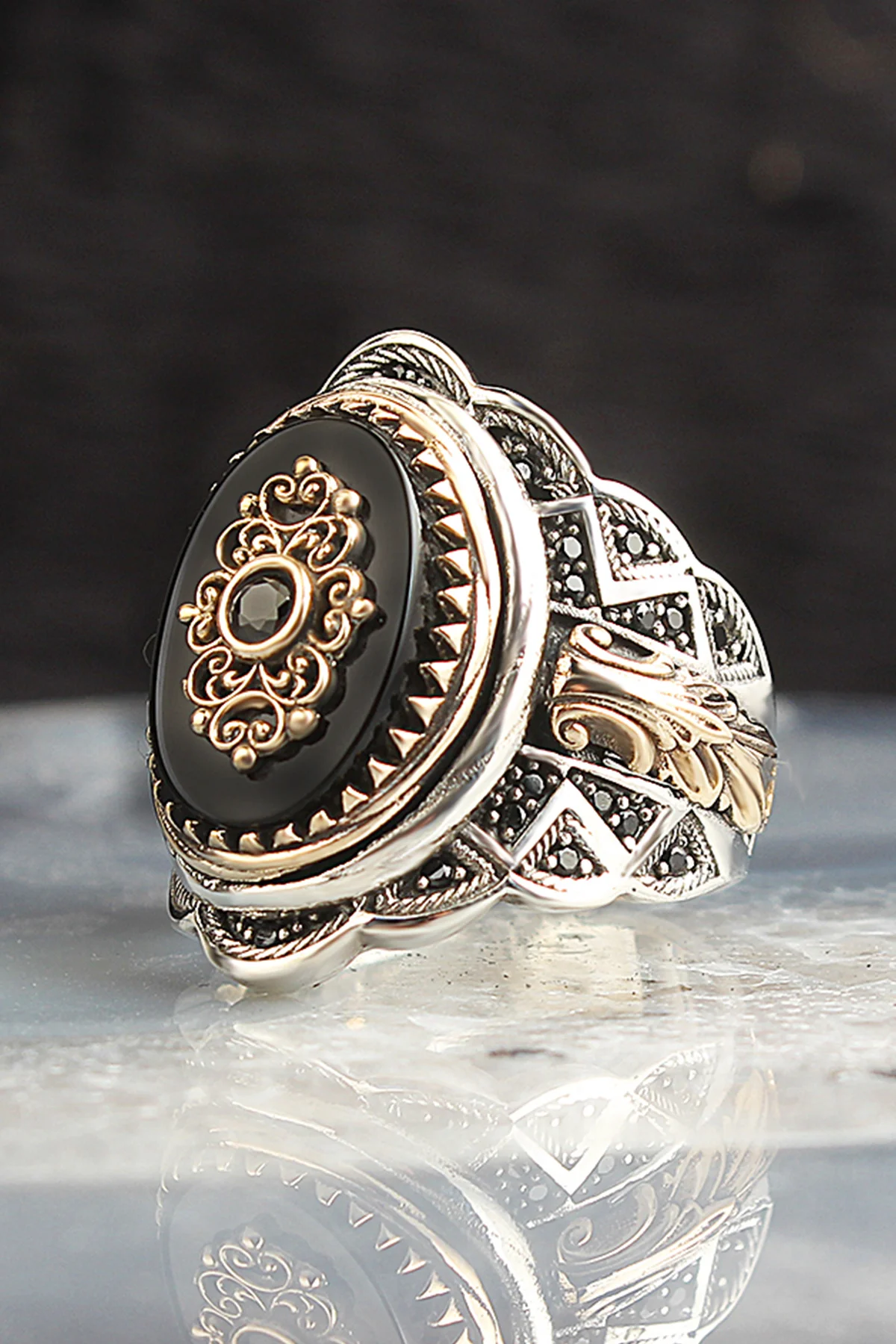 

Мужское серебряное кольцо с ониксом