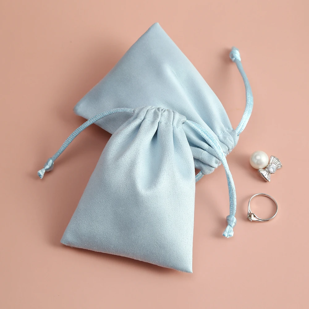 50pcs 7x9cm Light Blue Flannel Drawstring Packing Jewelry Packaging Display Luxury Velvet Suede Pouches Wedding Favors Gift Bags