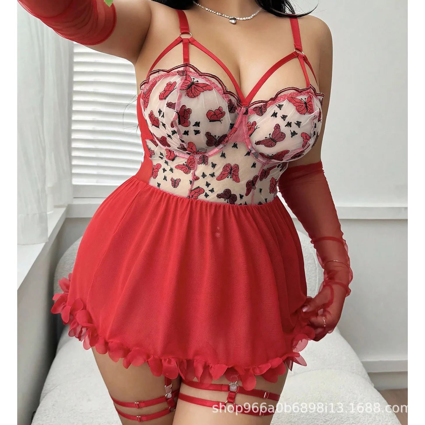 Plus size lingerie with sheer mesh fabric, butterfly embroidery, and ruffle hem trim