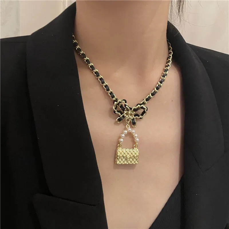 WovenleathernecklacechainnecklacewithfashionlockpendantChainAccessorieswomanjewelry