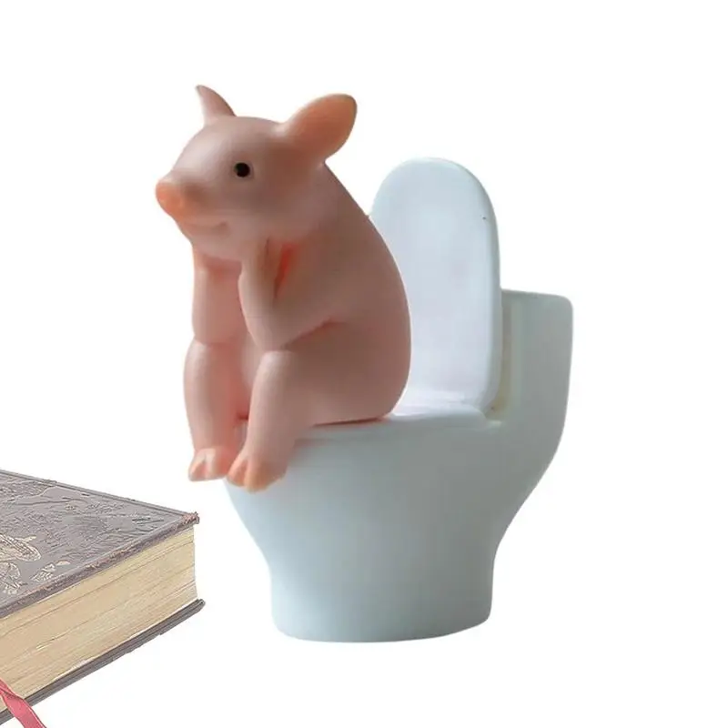 

Cartoon Pig Desktop Ornaments Piggy Sitting On Toilet Figure Miniature Animal Decoration Creative Toy Kids Gift Desktop Decor