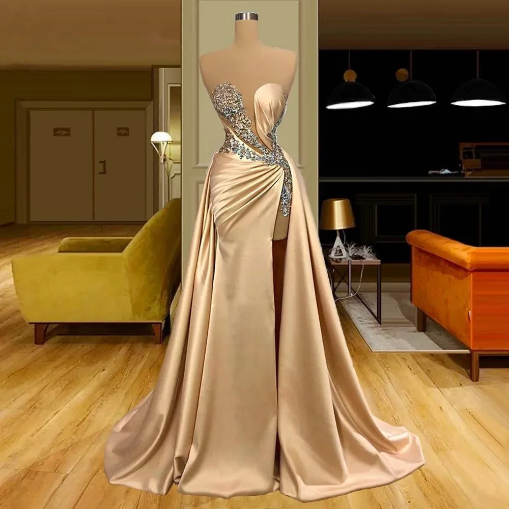 

2024 Champagne Gold Evening Dresses Sexy Illusion Mermaid Prom Gown Applique Beading High Split Satin Party Gowns With Overskirt