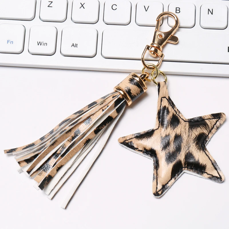 Portachiavi con nappa in pelle PU Sansango per donna ragazza ciondolo stella chiusura a moschettone portachiavi accessori per borse - immagine 6