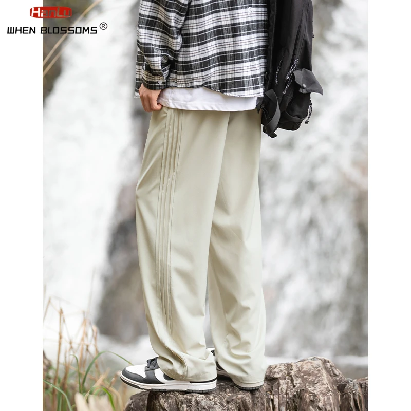 Korean Popular Men Pants Solid Elastic Lightweight Pants Women Summer Casual  Loose straight tube without wrinkles Trousers