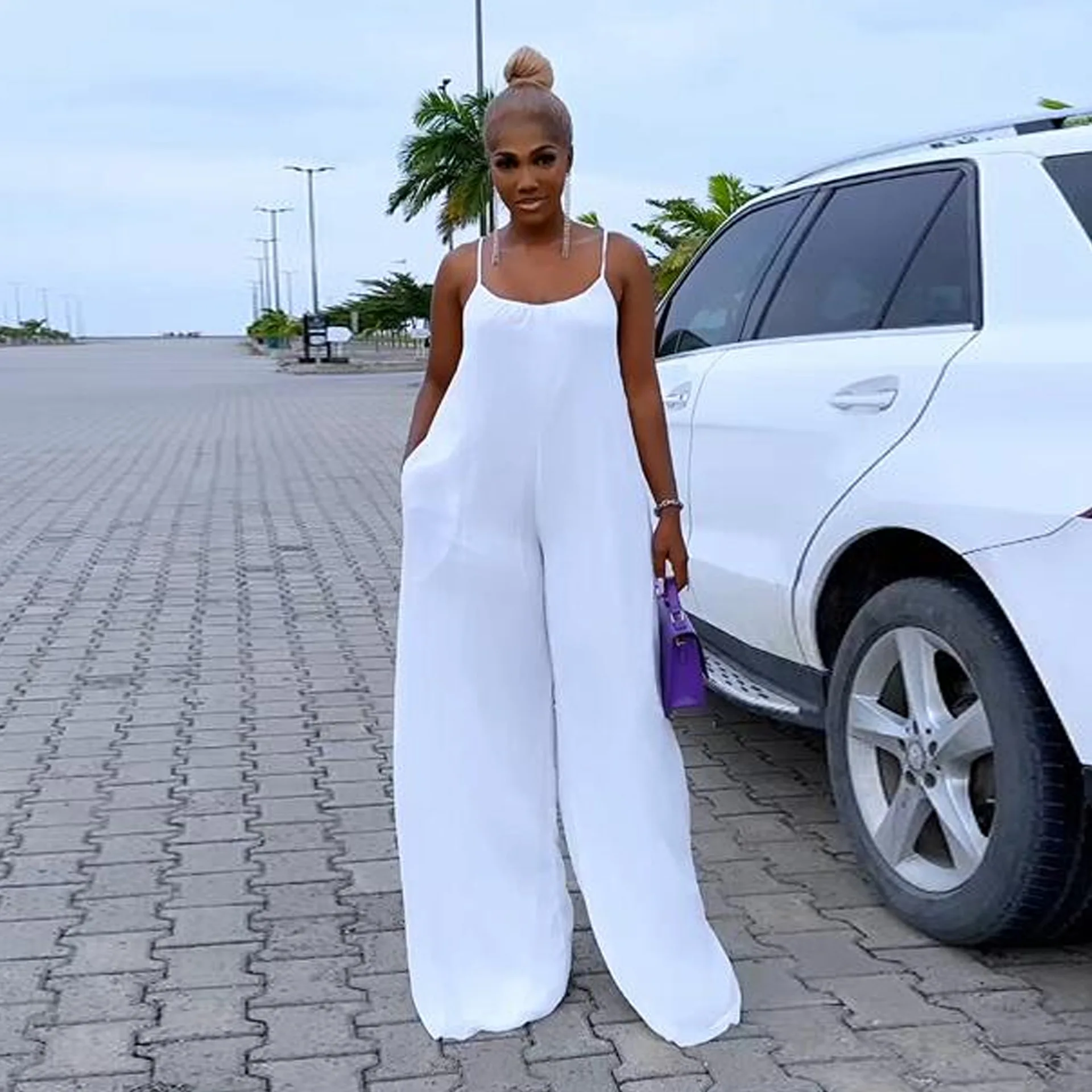 

Zoctuo Spaghetti Strap Sleeveless Jumpsuit For Women Sexy Backless Loose White Wide Leg Casual Jumpsuits Female Party Holiday
