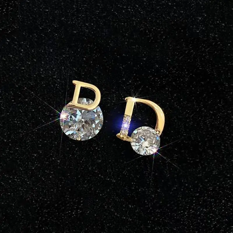 

Delicate asymmetrical stud simple small letter D earrings female Korean temperament net red 2023new ear accessories Free freight
