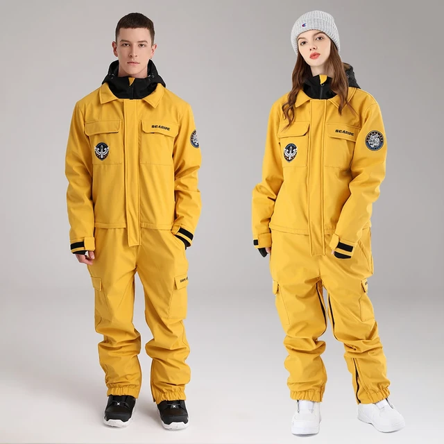 Mono de esquí grueso de una pieza para hombre y mujer, chaqueta de  Snowboard para deportes al aire libre, traje de salto cálido, ropa de  invierno impermeable, monos con capucha - AliExpress